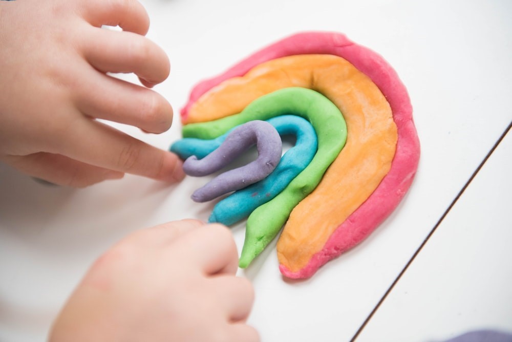 How can I help my child improve his/her fine motor skills?
